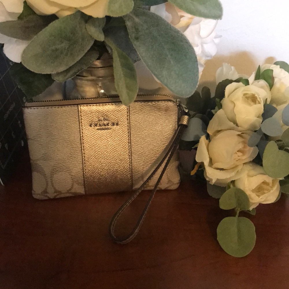 Coach wristlet s/v platinum